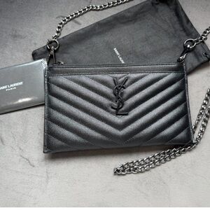 Yves Saint Laurent black monogram clutch / crossbody